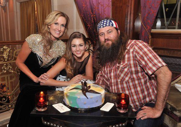 Korie Robertson, Sadie Robertson, and Willie Robertson attend an Evening By Sherri Hill fashion show after party during Mercedes-Benz Fashion Week Spring 2014 at The Plaza Hotel in New York City on Sept. 9, 2013. (Henry S. Dziekan III/Getty Images)