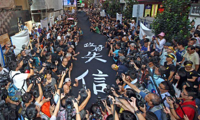 Black Means Indignation in Hong Kong, as Thousands Demand Universal Suffrage