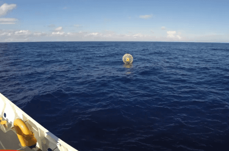 Ray "Reza" Baluchi floats on the waves in his original "Hydro Pod" during his 2014 rescue by the U.S. Coast Guard. (Courtesy of the U.S. Coast Guard)