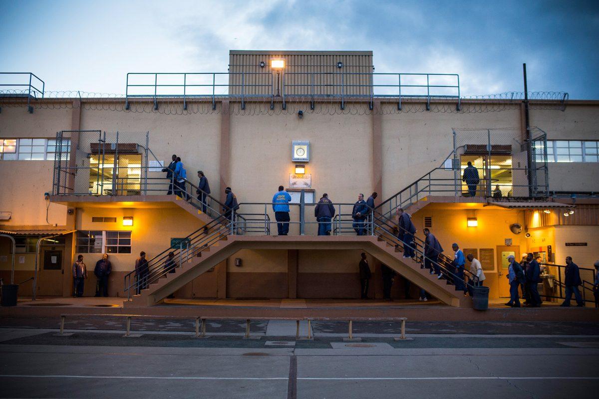 Prisoners wait in line for breakfast at the California Men's Colony prison in San Luis Obispo, Calif., on Dec. 19, 2013. (Andrew Burton/Getty Images)