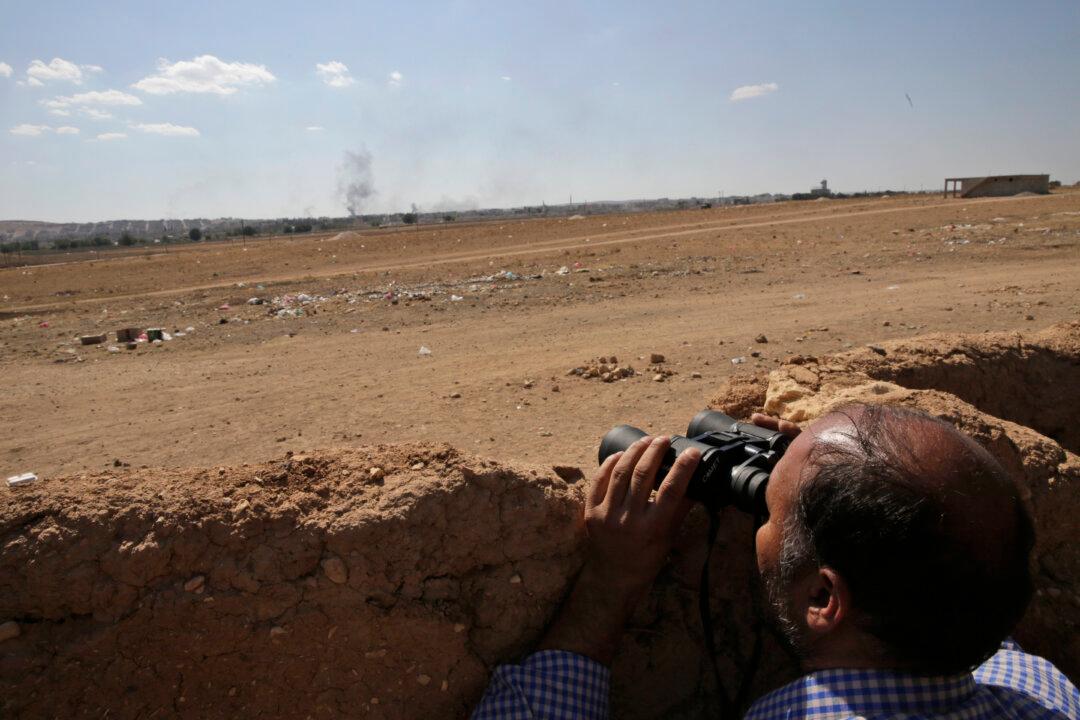 Airstrikes Push Jihadists Back in Syrian Town