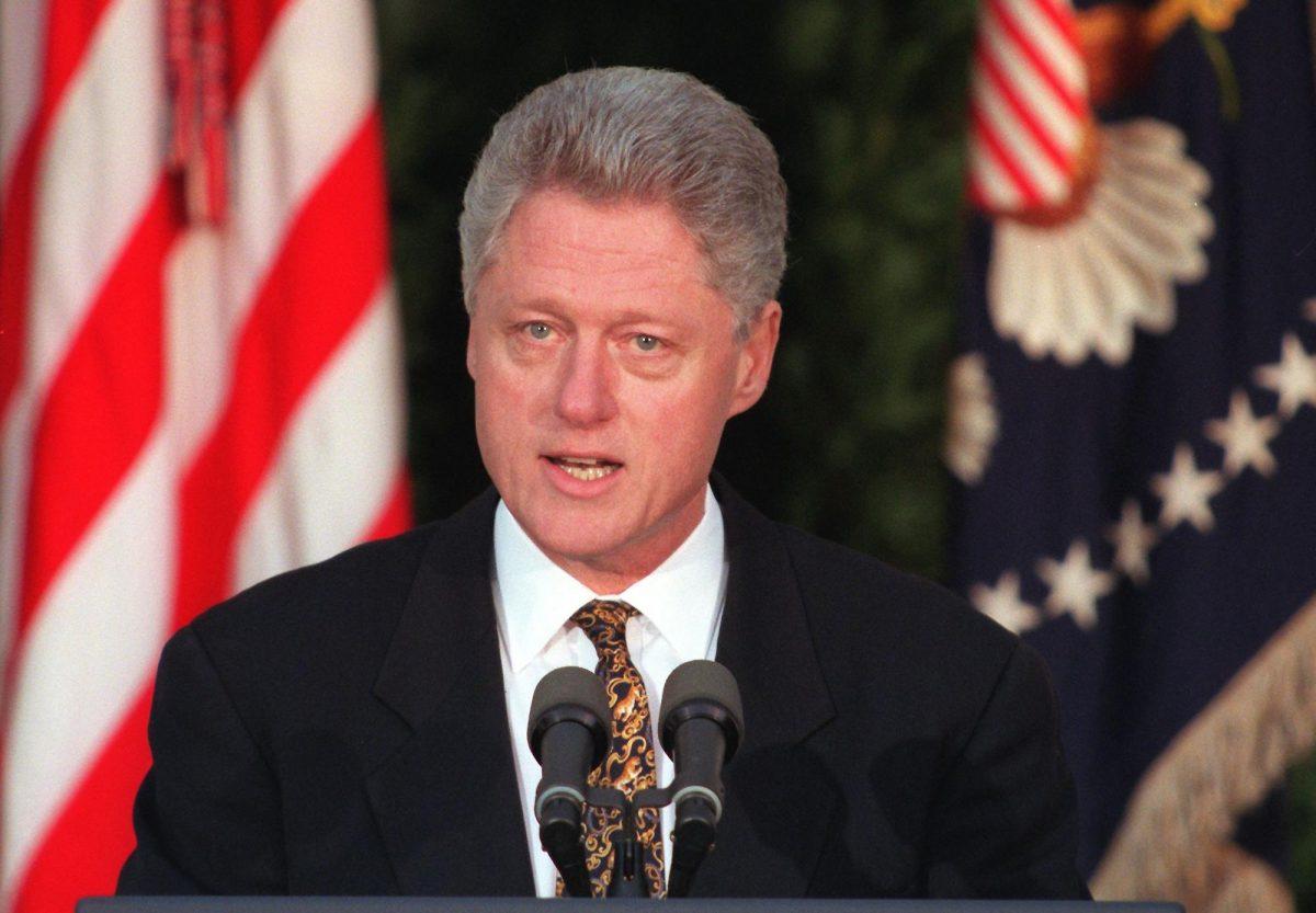 President Bill Clinton addresses the nation from the Rose Garden of the White House in Washington, on Dec. 11, 1998, to apologize for misleading the country about his relationship with White House intern Monica Lewinsky. (William Philpott/AFP/Getty Images)