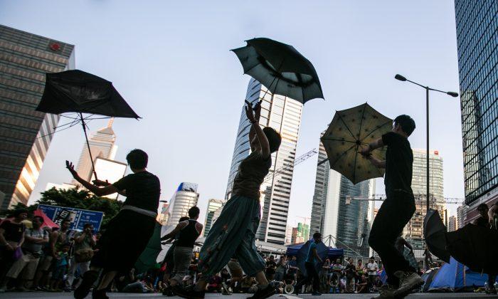 Protesting With Grace in Hong Kong Umbrella Dance