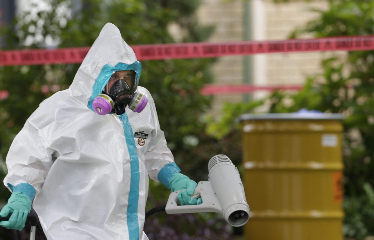 A hazmat worker is seen in a file photo. (LM Otero/AP Photo)