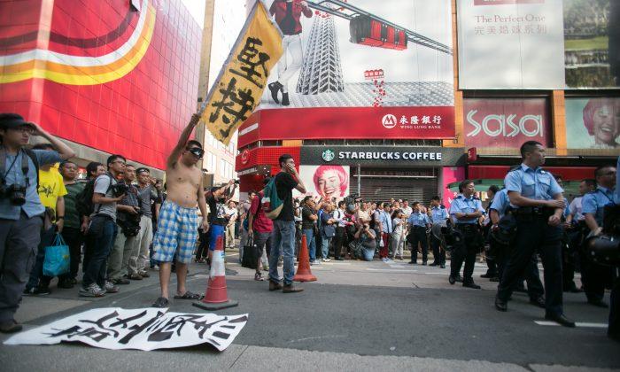 Protesters Comment on Clearing of Mong Kok in Hong Kong