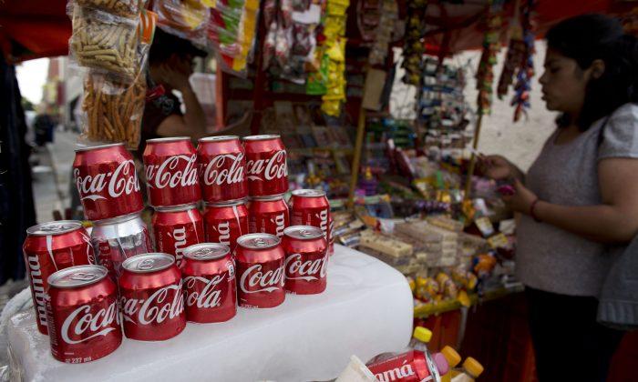 Coca-Cola to Slash Costs, Jobs as Soda Sales Remain Flat