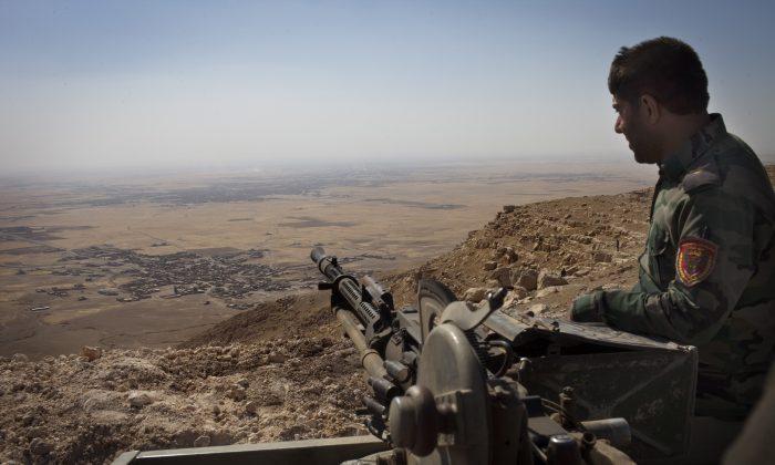 Iraqi Kurdish Lawmakers Authorized Its Peshmerga Fighters to Help Syrian Kurds