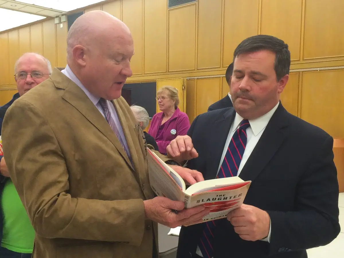 Ethan Gutmann talks about his book "The Slaughter" with Jason Kenney, Canadian Minister of Employment and Social Development and Minister for Multiculturalism, on Oct. 20, 2014. (Matthew Little/The Epoch Times)