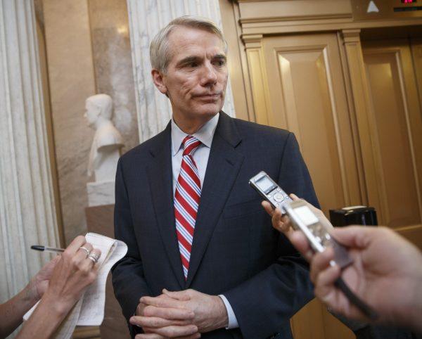 Sen. Rob Portman (R-Ohio) speaks to reporters on Capitol Hill in Washington on May 12, 2014. (AP Photo/File)