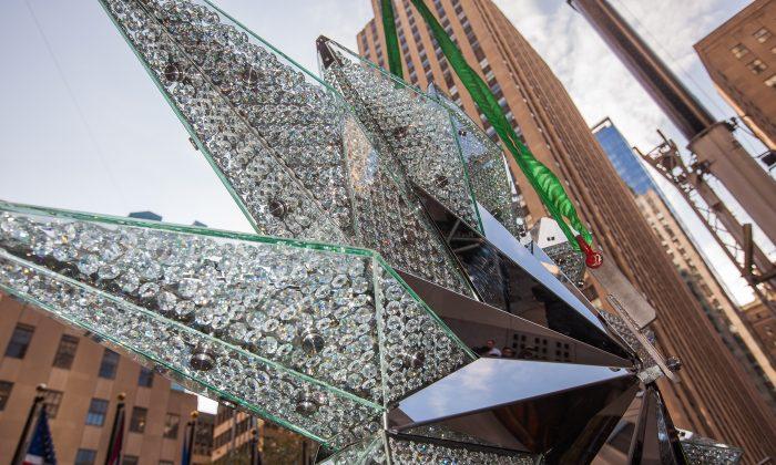 Swarovski Star Ascends Rockefeller Christmas Tree in NYC