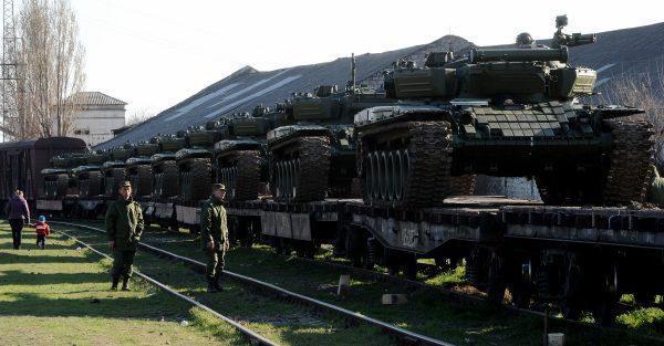 Russian soldiers stand near a trainload of their modified T-72 in another file photo. (Olga Maltseva/AFP/Getty Images)