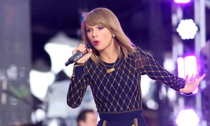 Taylor Swift Addresses Belly Button Rumors, Says It Might be Pierced