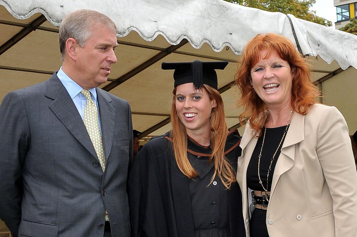 Britain's Prince Andrew, left, and Sarah, Duchess of York, right, pose together with their daughter, Princess Beatrice following her graduation ceremony at Goldsmiths College, London, on Sept. 9, 2011. (Ian Nicholson/AP Photo)