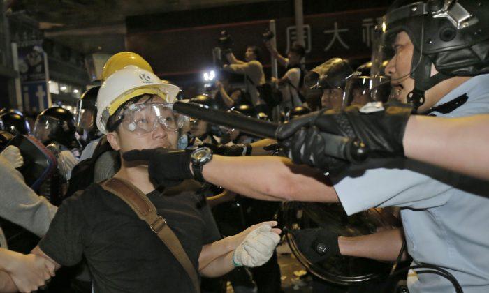 Hong Kong Police Arrest 116 at Occupy Central Protest Site