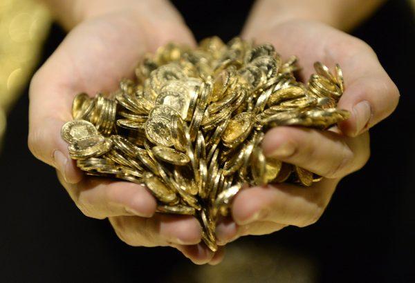 Gold coins during an exhibition in Lenzburg, Switzerland, on Nov. 16, 2014. China is getting as much gold as it can get its hands on as well. (Steffen Schmidt/AP Photo)