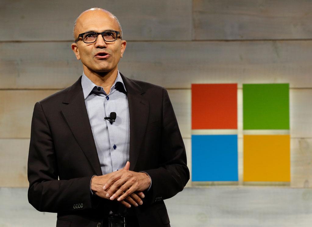 Microsoft Chief Executive Satya Nadella speaks at Microsoft Corp.'s annual shareholders' meeting in Bellevue, Wash., on Dec. 3, 2014. The annual meeting was Nadella's first as head of Microsoft. (AP Photo/Ted S. Warren)