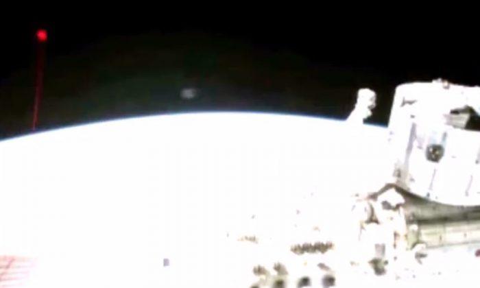 UFO or Satellite? ‘Strange Red’ Sphere Appears Over Earth on International Space Station Camera