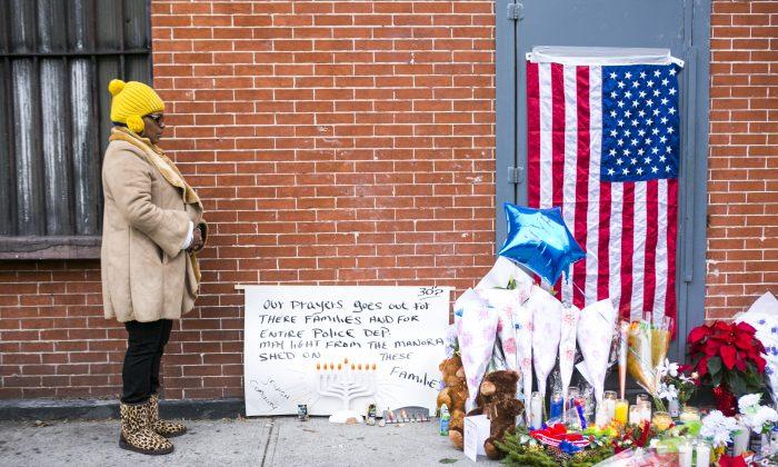 New Yorkers Pay Respects to Police Officers Dead in Brooklyn Shooting
