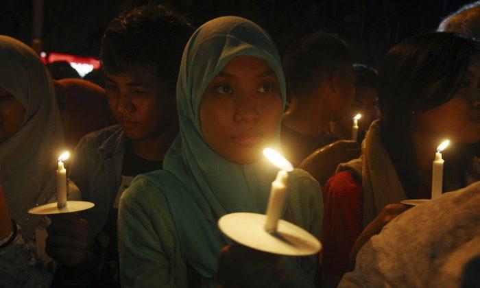 AirAsia Crash Update: Hayati Lutfiah Hamid ID'd as First Victim, Buried