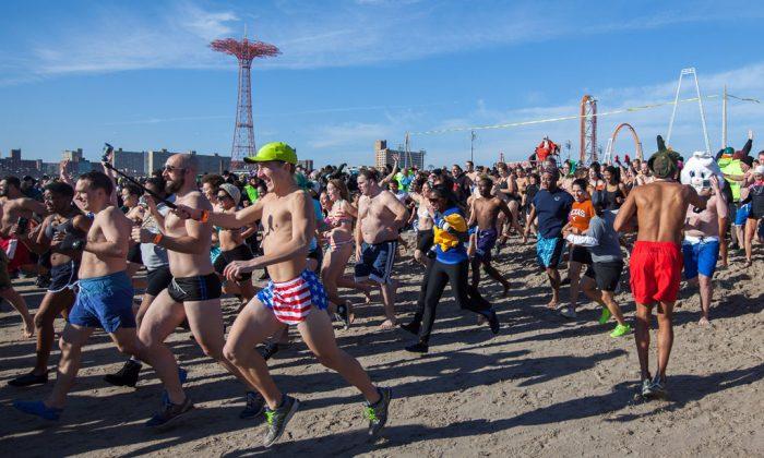 Thousands Swim Ocean for New Year’s Fun and Charity