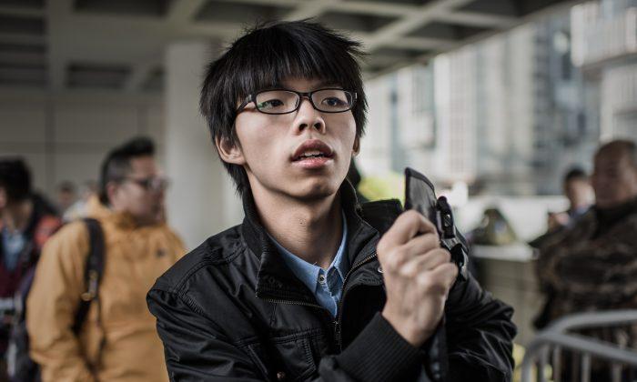 Hong Kong Court Drops Joshua Wong’s Case, Awards Damages