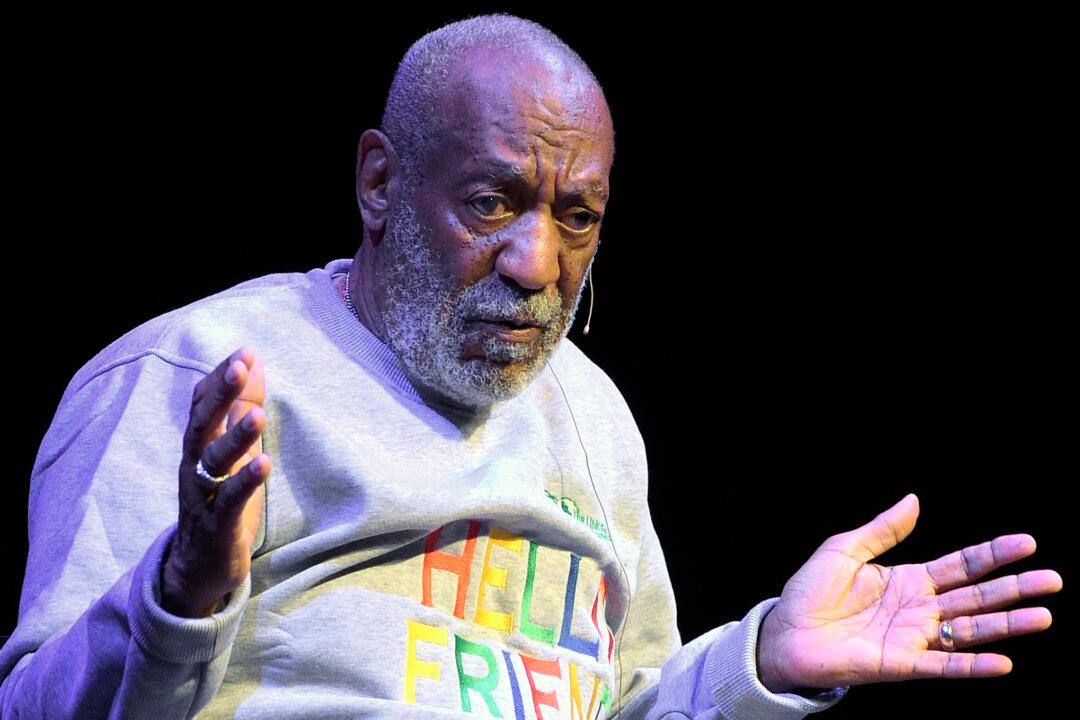 Watch Unreal Video Showing Bill Cosby Stumbling His Way to Court After Arrest