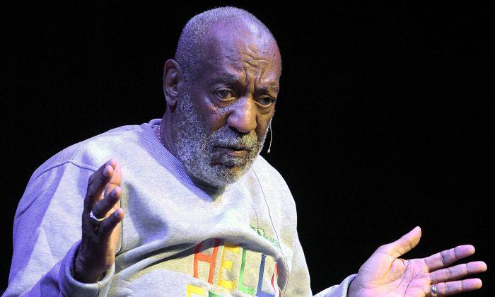 Watch Unreal Video Showing Bill Cosby Stumbling His Way to Court After Arrest