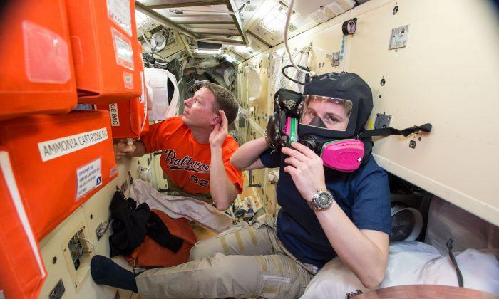 Astronauts Flee US Side of Space Station but No Sign of Leak