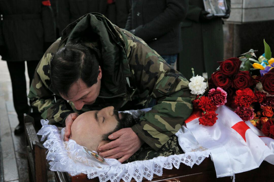 Russia, Ukraine Agree Pullback Line for Heavy Arms