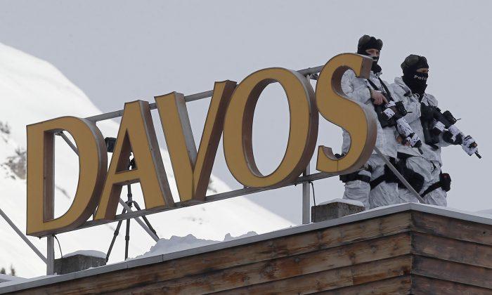 DAVOS WATCH: Anxiety Over Greece, Currency Wars, QE Support
