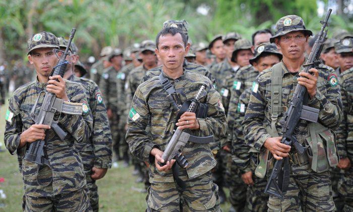Muslim Rebels in Philippines to Start Turning Over Weapons