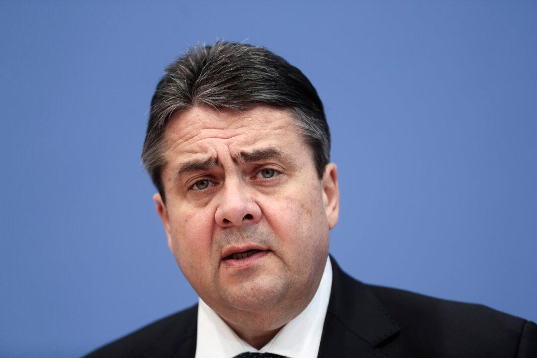 German Orders Beat Forecasts, Central Bank Ups Outlook