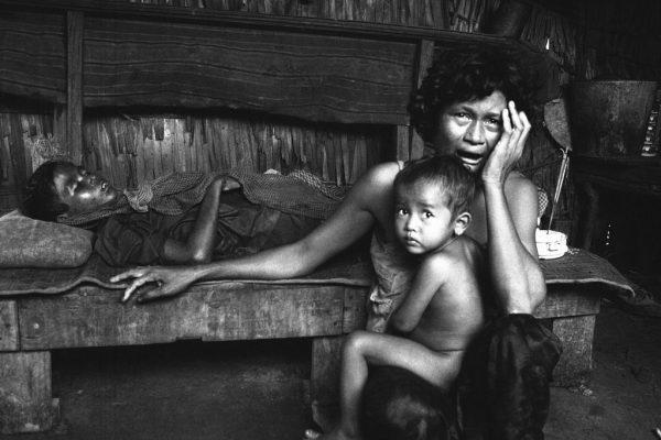 A Cambodian mother cries over her son who was a victim of an insurgent mortar attack, following the attack on a hamlet in the Kompong Speu area in Cambodia on Oct. 20, 1974. (AP Photo/Chor Yuthy)