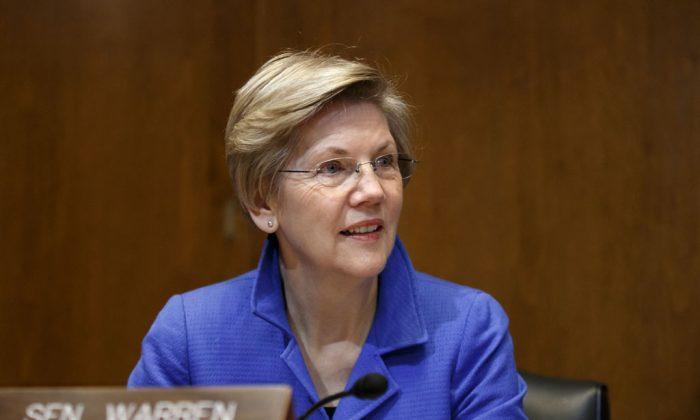 Warren Urges 2016 Candidates to Fight ‘Revolving Door’