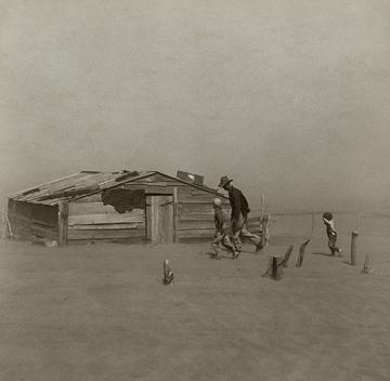 A dust storm forces a family to take shelter in Oklahoma during the droughts of the 1930s. (Arthur Rothstein, for the Farm Security Administration)