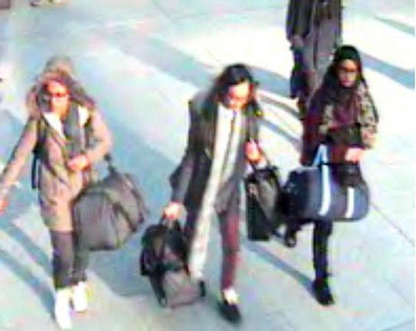 A still taken from CCTV issued by the Metropolitan Police in London on Feb. 23, 2015, of 15-year-old Amira Abase (L), Kadiza Sultana, 16 (centre), and Shamima Begum, 15, going through Gatwick Airport, south of London, before they caught their flight to Turkey on Feb. 17, 2015. (AP Photo/Metropolitan Police)