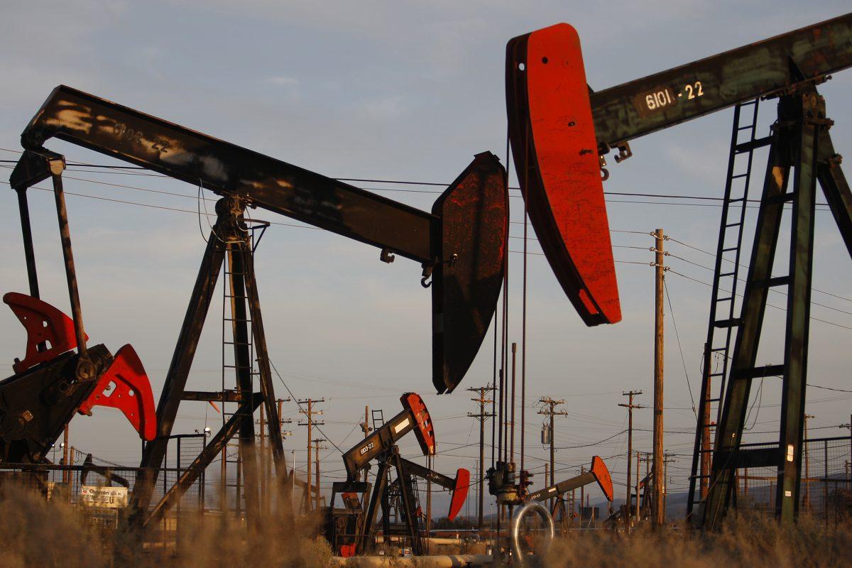 Pump jacks and wells are pictured in an oil field on the Monterey Shale formation where gas and oil are being extracted by hydraulic fracturing near McKittrick, Calif., on March 23, 2014. (David McNew/Getty Images)