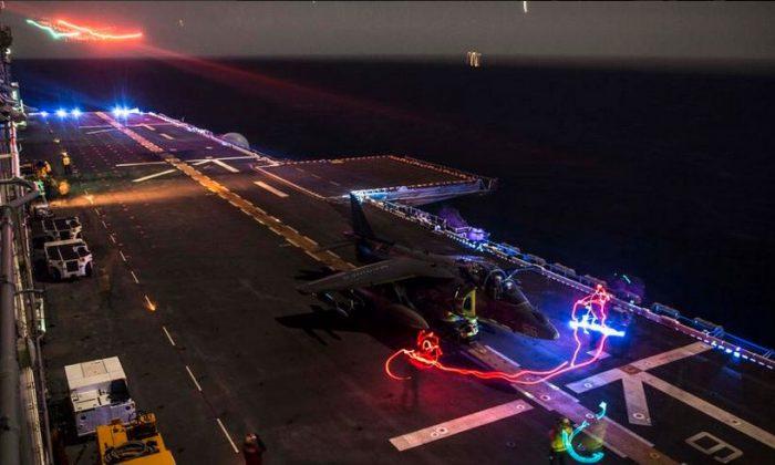 See Amazing Night Shot of Harrier Jet Operations on Aircraft Carrier