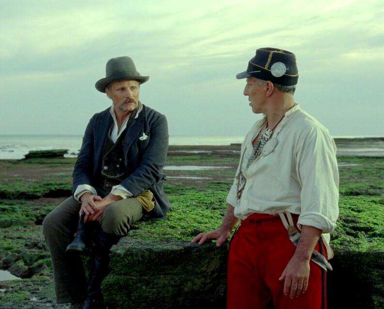 Gunnar Dinesen (Viggo Mortensen, L) being asked by a soldier (Diego Roman) whether he can take Gunnar's teenage daughter on a date, in "Jauja." (The Cinema Guild)