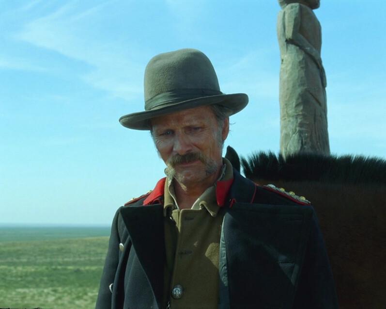 Gunnar Dinesen (Viggo Mortensen) looks down at his feet, standing in the grass, in "Jauja." (The Cinema Guild)