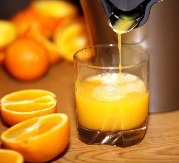 An important consideration when juicing is to limit the amount of high sugar fruits, as they can feed yeast and other opportunistic organisms. (<a href="http://www.shutterstock.com/pic-67054789/stock-photo-making-orange-juice-from-sliced-oranges.html?src=csl_recent_image-9" target="_blank" rel="noopener">Shutterstock</a>*)