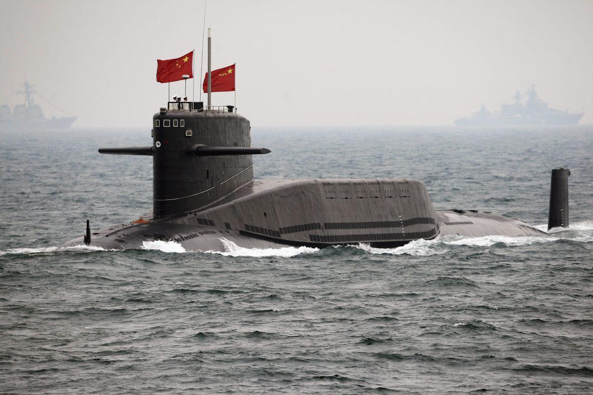 A Chinese naval nuclear-powered submarine sails during an international fleet review for the 60th anniversary of the founding of the People's Liberation Army Navy, on April 23, 2009. (Guang Niu/AP Photo)