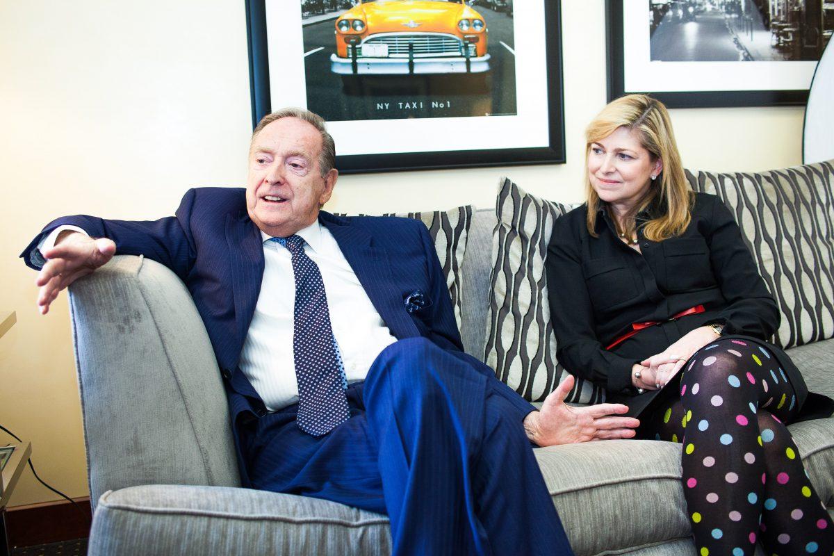 Bill Fisher, founder of the Fischer Travel Enterprises, and his daughter Stacy Fischer-Rosenthal in the company's office in Midtown Manhattan, New York, on April 10, 2015. (Petr Svab/Epoch TImes)