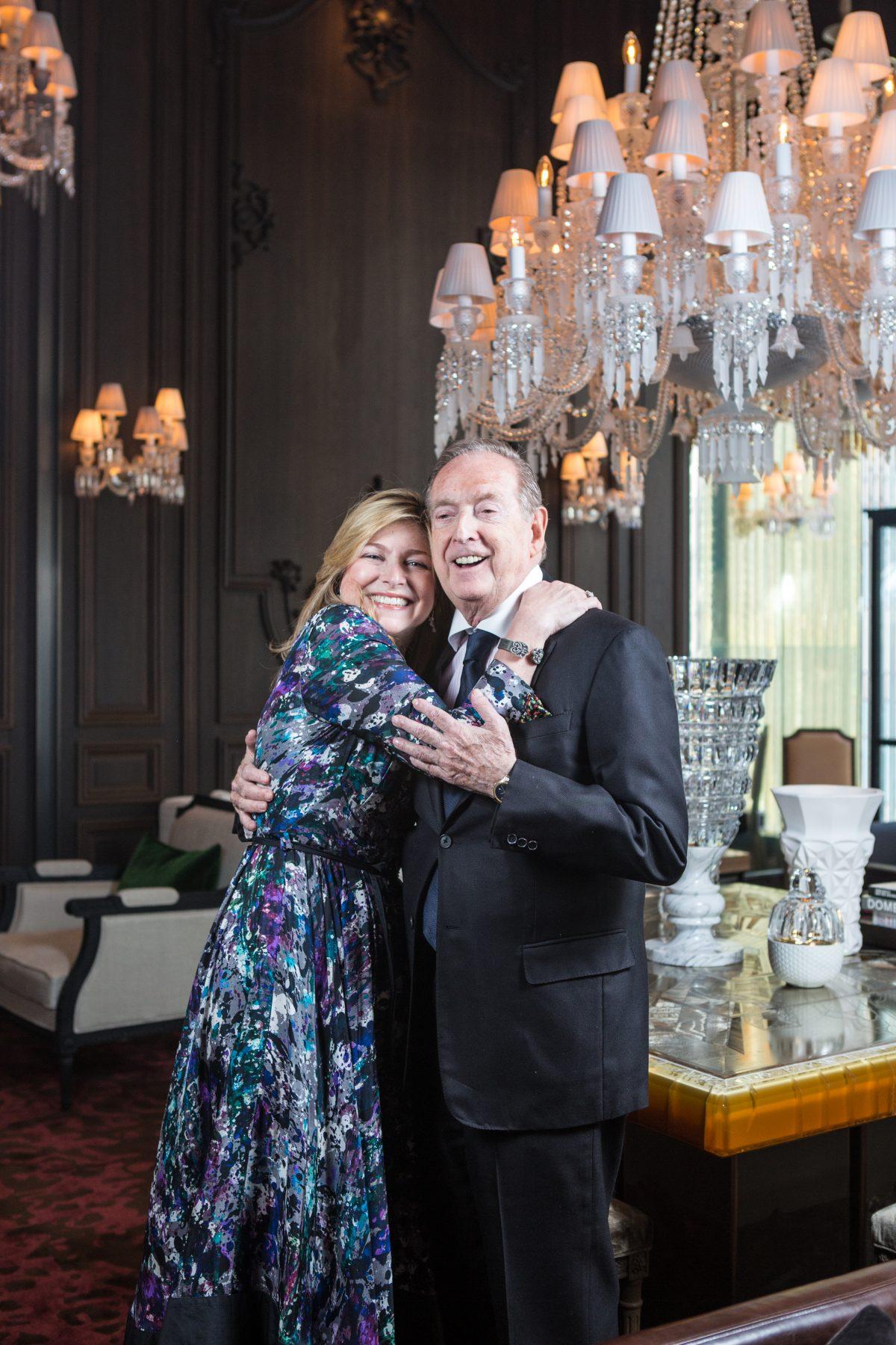 Stacy Fischer-Rosenthal with her father Bill Fischer, founder of the Fischer Travel Enterprises, inside the Petite Salon at the new Baccarat Hotel in Midtown Manhattan on April 15, 2015. (Samira Bouaou/Epoch Times)