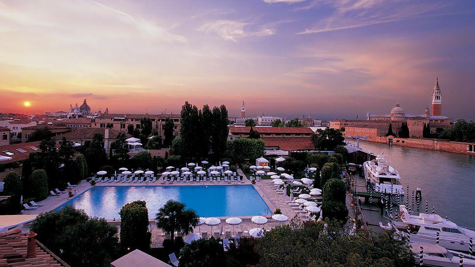 The pool of the Belmond Hotel Cipriani in Venice is rated one of the most luxurious in Italy. (Belmond)