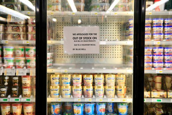 Shelves are bare and signs are posted where Blue Bell products were displayed in a grocery store on April 21, 2015 in Overland Park, Kansas. Blue Bell Creameries recalled all of its products at that time following a Listeria contamination. (Jamie Squire/Getty Images)