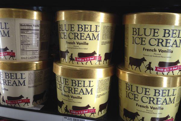 In this April 10, 2015, file photo, Blue Bell ice cream rests on a grocery store shelf in Lawrence, Kan. Texas-based Blue Bell Creameries issued a voluntary recall Monday, April 20, 2015, for all of its products on the market after two samples of chocolate chip cookie dough ice cream tested positive for listeriosis. (AP Photo/Orlin Wagner, File)