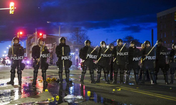 Baltimore on Edge as Curfew Approaches; National Guard Takes Up Posts