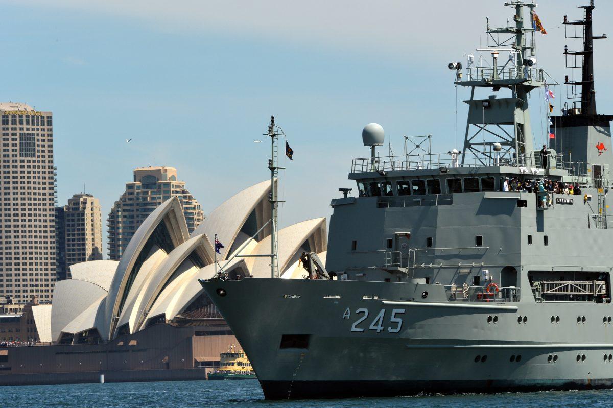 Australia's warship HMAS Leeuwin sails during the 2013 International Fleet Review in Sydney on Oct. 5, 2013. Australia is considering sending navy ships to help challenge the Chinese regime's claims in the South China Sea. (Saeed Khan/AFP/Getty Images)