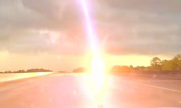 Cop’s Dashcam Footage Captures Lightning Strike